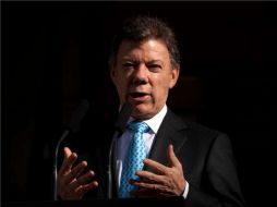Santos afirma que Venezuela no tiene campamentos de las FARC. AP  /