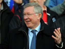 Alex Ferguson, festeja el pase a semifinales de la Champions League tras vencer al Chelsea en el partido de vuelta. AFP  /