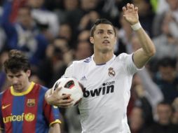 Lionel Messi y Cristiano ronaldo durante el Clásico Español. AP  /