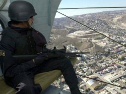 Ante la ola de violencia, agentes municipales, estatales y federales realizan operativos por aire y tierra. NTX  /