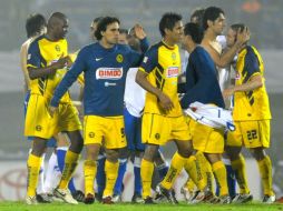 Los jugadores de América celebran su pase a octavos de final. AFP  /