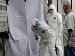 Aspecto de forenses en Tamaulipas, donde se han hallado casi 200 cadáveres. EL UNIVERSAL  /