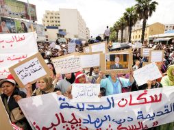 'No a los centros de detención secretos' estas frases se plasman en algunas de las pancartas. EFE  /