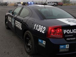 Autoridades de distintas corporaciones policíacas confirmaron el homicidio del empresario lechero. ARCHIVO  /