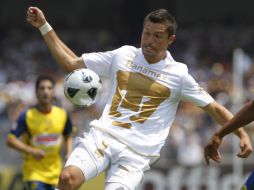 El equipo de Dante López va a los cuartos de final del Torneo Clausura 2011 contra Monterrey. MEXSPORT  /