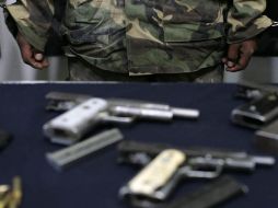A los detenidos también se les aseguraron armas. ARCHIVO  /