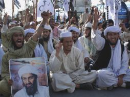 Los seguidores del Talibán han prometido vengar la muerte de su líder; hay alertas de seguridad en el mundo. AP  /