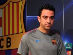 El jugador del Barcelona, Xavi Hernández, llega al Camp Nou para conferencia de prensa. AFP  /