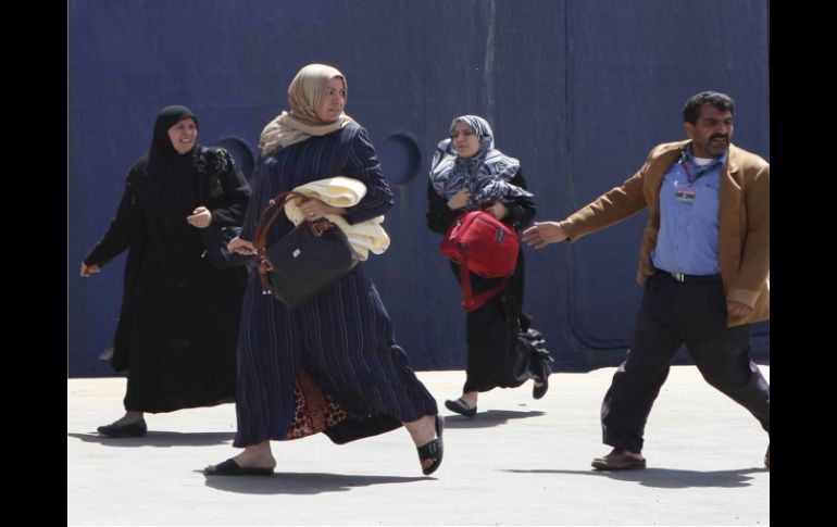 La OIM comentó que aún hay cientos de personas atrapadas en la violencia de Misrata. NOTIMEX  /