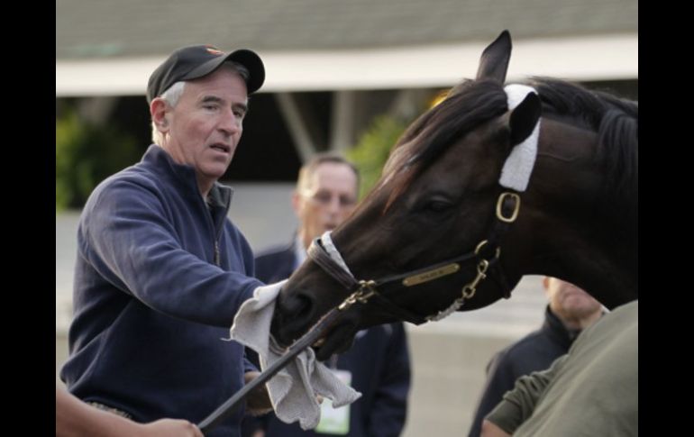 El entrenador, Nick Zito, junto al favorito para el Derby Kentucky, 'Dialed In'. REUTERS  /
