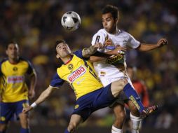 Acciones del duelo de ida entre el América y Morelia. AP  /