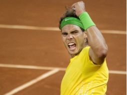 Reacción de Rafael Nadal tras vencer a Roger Federer. AP  /