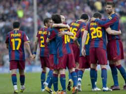Los jugadores del Barcelona en su pasada victoria ante el Espanyol. EFE  /