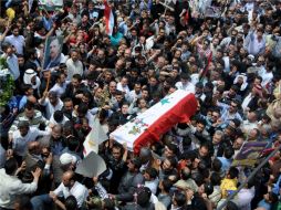 Funeral de miembros de manifestaciones en Siria. AFP  /