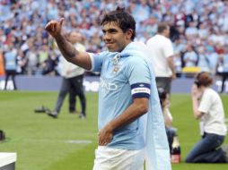 Carlos Tévez, capitán del Manchester City, festeja tras ganar la FA Cup. EFE  /