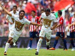 Javier Cortés festeja después de concretar la primera anotación de Pumas. MEXSPORT  /