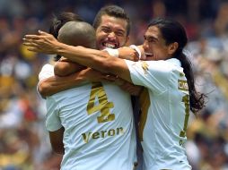 Los jugadores de Pumas festejando su triunfo ante Chivas con lo que llegaron a la final de la Liguilla. MEXSPORT  /