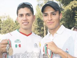 Los arqueros tapatíos Juan René Serrano y Luis Vélez no tienen tiempo de descanso, pues se preparan duro. MEXSPORT  /