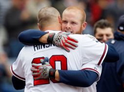 Brian McCann celebra con su compañero Eric Hinske. AFP  /