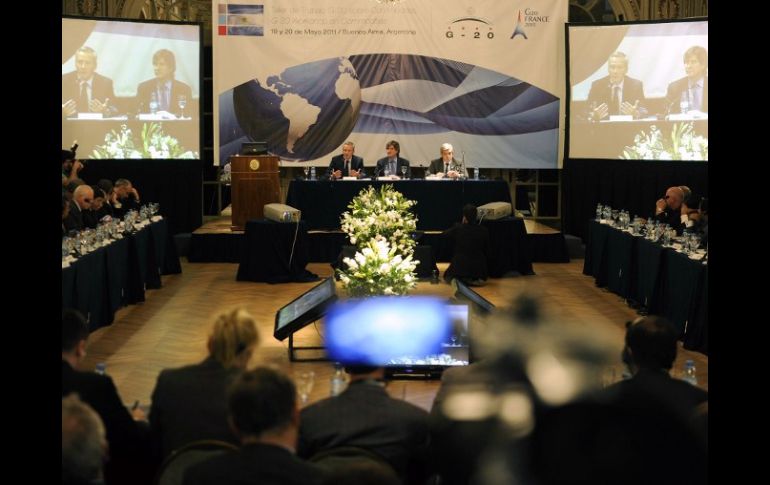 Ministros Bruno Le Maire Boudou (I), Amado Boudou y Julián Domínguez (D) en junta del G-20. AFP  /