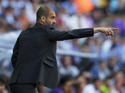 Josep Guardiola durante el encuentro de la última jornada de la Liga Española, disputado ante Málaga. EFE  /
