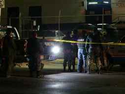 Agentes de la Procuraduría estatal acudieron al sitio del hallazgo para realizar las investigaciones del caso. ARCHIVO  /