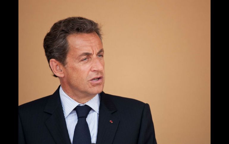 El mandatario francés advierte que su esposa no puede viajar en avión. AFP  /