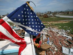 Los socorristas siguen con la búsqueda de sobrevivientes tras el paso del tornado que ha matado a 122. AFP  /