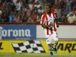 Christian Suárez festeja un gol ante Estudiantes, durante el Torneo Clausura. MEXSPORT  /