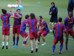 Los jugadores de Barcelona durante una sesión de entrenamiento. AFP  /