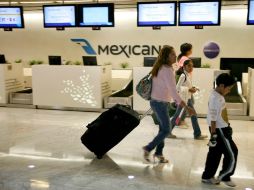 Entre septiembre del 2010 y marzo de este año, la caída en la llegada de turistas por avión fue de 157 mil 200 pasajeros. ARCHIVO  /