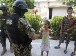Tras el arribo de la Policía Federal, el Ejército Mexicano y la Armada de México, la tranquilidad ha retornado a la zona. REUTERS  /