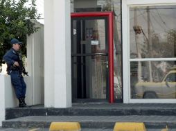 En bancos, se obligaría a disponer de elementos armados, pero de empresas privadas. ARCHIVO  /