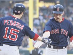Jacoby Ellsbury es felicitado luego de conectar un cuadrangular ayer ante Detroit. AP  /