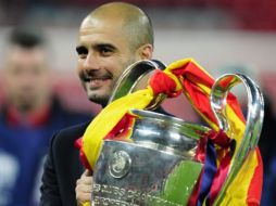 El técnico de Barcelona, Josep Guardiola, celebra la victoria de la Champions League. EFE  /
