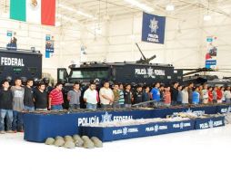 Tras los enfrentamientos en Apatzingán, Michoacán, la PFaseguró a 36 presuntos integrantes de ''La Familia''. EL UNIVERSAL  /