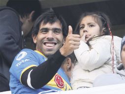 Carlos Tévez fue ovacionado por los aficionados de su ex equipo, Boca, durante el partido que ayer ganó 1-0 a Newell’s. EFE  /