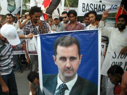 Bashar al-Assad, emitió decreto concediendo amnistía general. AFP  /