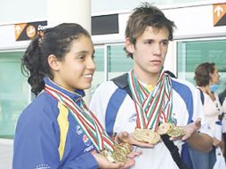 Rodrigo Martínez (derecha) ha sumado en su historia 43 preseas dorasdas en esta edición sumó ocho. ESPECIAL  /