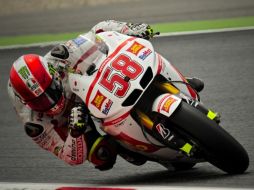 El italiano fue el protagonista de una carrera muy ajustada, en la que arrebató el primer lugar a Stoner. AP  /