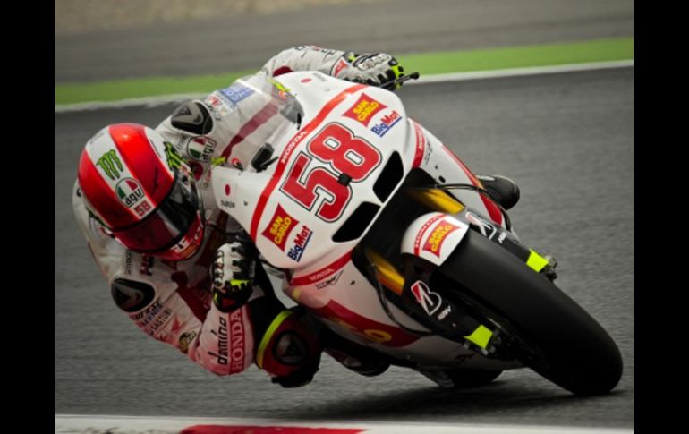 El italiano fue el protagonista de una carrera muy ajustada, en la que arrebató el primer lugar a Stoner. AP  /