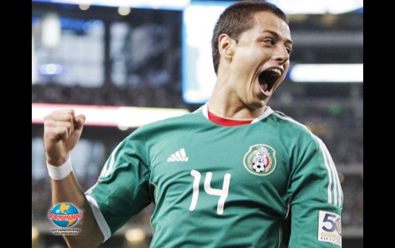 ''Chicharito'' festeja su primera anotación del partido de anoche ante los salvadoreños. AP  /