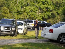 Autoridades mantienen un perímetro en la zona en donde se realizó la búsqueda de una supuesta fosa común en Hardin, Texas.EFE  /
