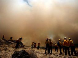 La extensión alcanzada por el fuego, convierte al Wallow en el segundo mayor incendio forestal de Arizona. AP  /