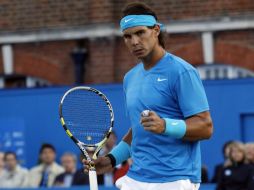 El tenista número uno Rafael Nadal celebra tras ganar un punto. REUTERS  /
