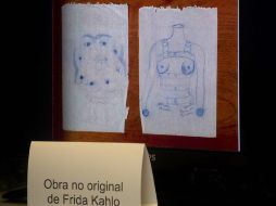 Dibujos atribuidos a la pintora mexicana se muestran en una pantalla durante una conferencia de prensa en el Museo Frida. AFP  /