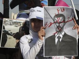 Sirios se manifiestan frente a su embajada en Amman, capital de Jordania. REUTERS  /