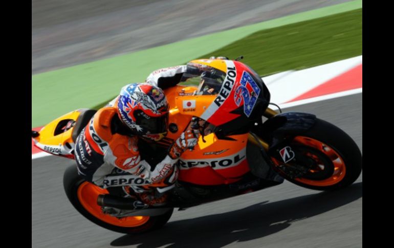 El australiano Casey Stoner durante la carrera de clasificación para el GP de Silverstone. AFP  /