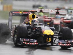 Sebastian Vettel durante la carrera antes de ser detenida. AP  /
