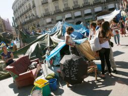 'Los indignados' en España desmantelaron su campamento de la Puerta del Sol de Madrid, donde se concentró la protesta casi un mes. EFE  /